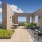 Rooftop Terrace with planters, tables and chairs